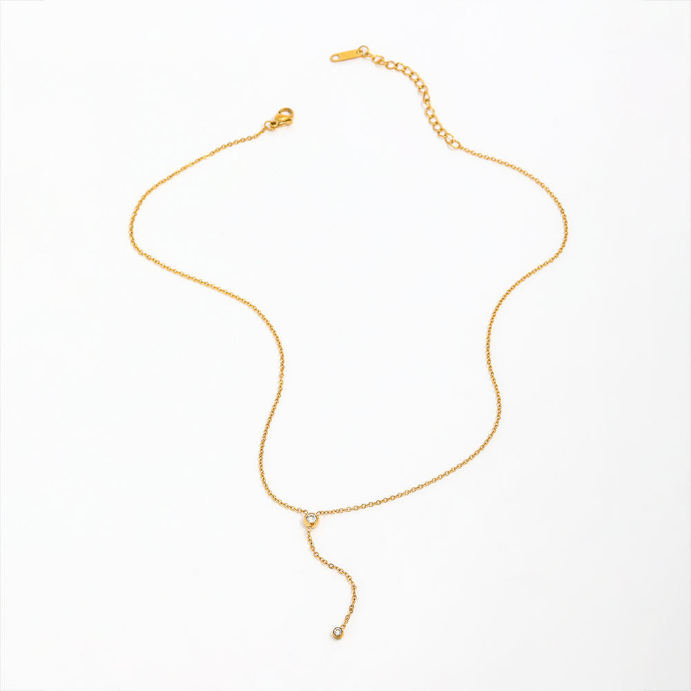 Gold necklace on a white background