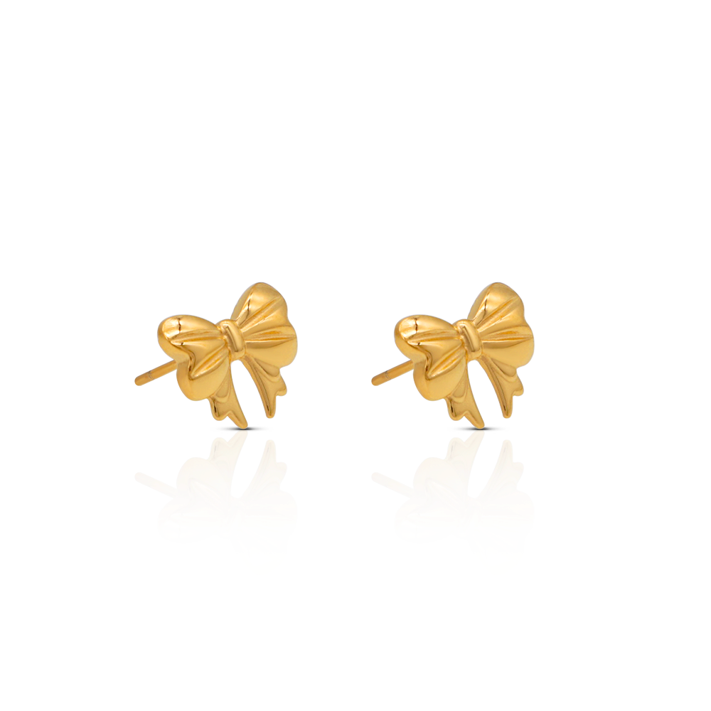 Gold bow-shaped earrings on a white background