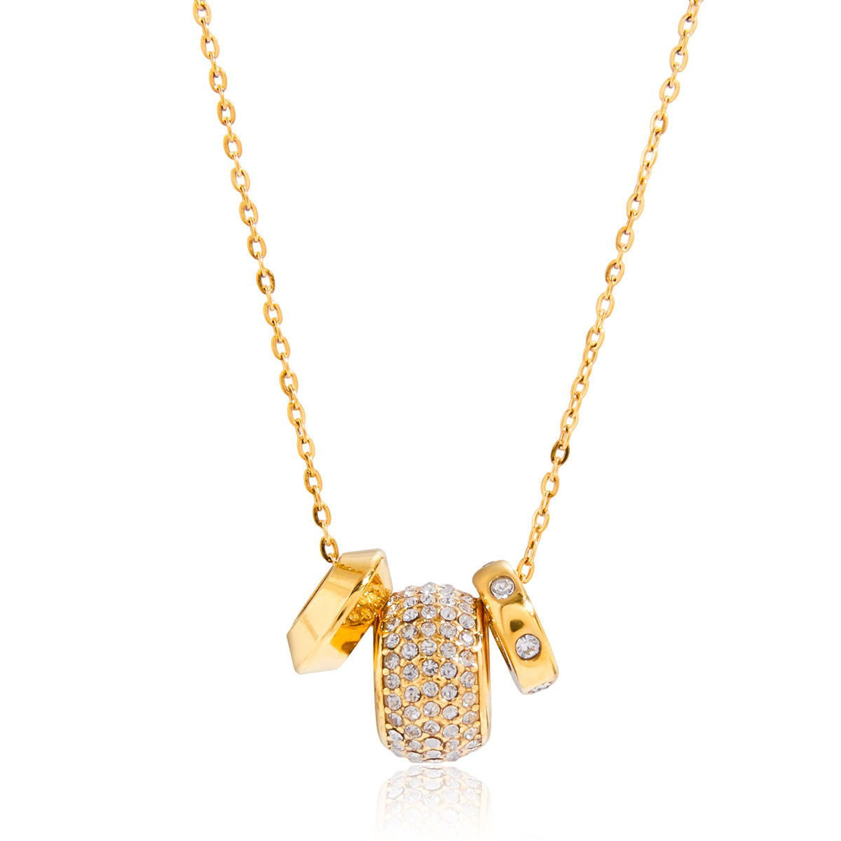 Gold necklace with three unique pendants on a white background