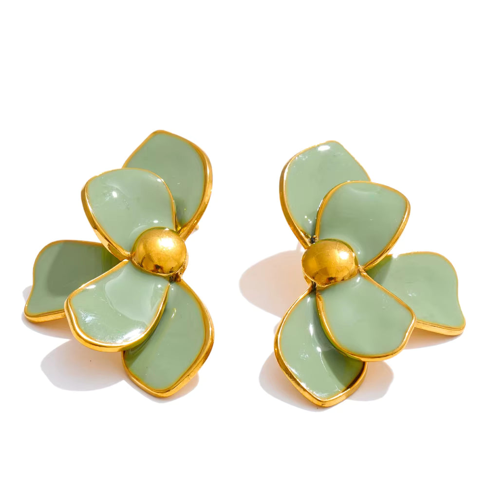 Pair of light green flower-shaped earrings with gold accents on a white background