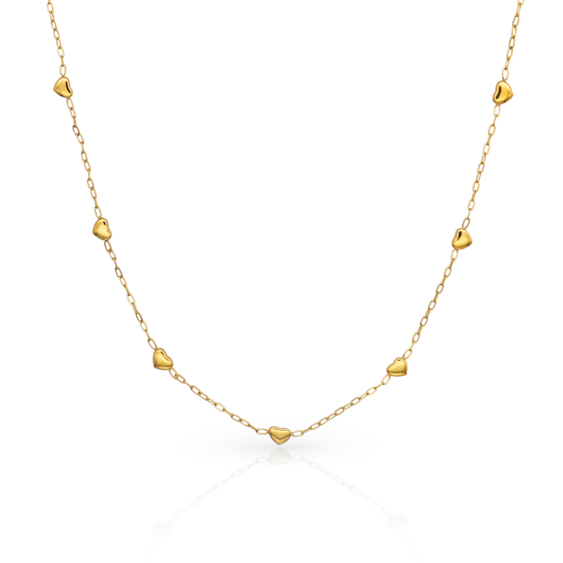 Gold necklace with heart-shaped pendants on a white background