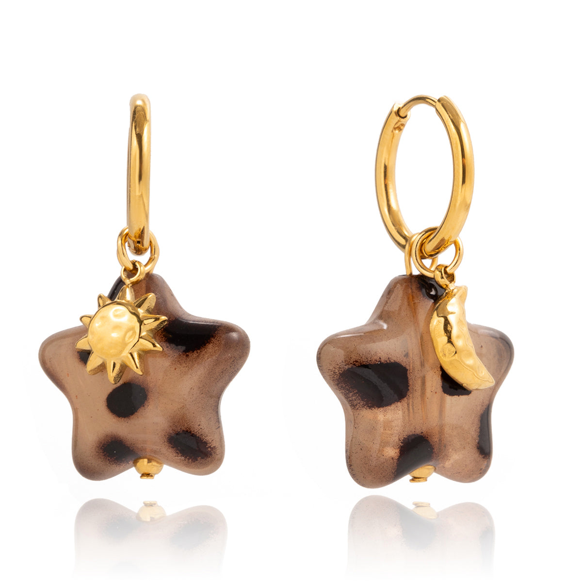 Star-shaped earrings with gold accents on a white background