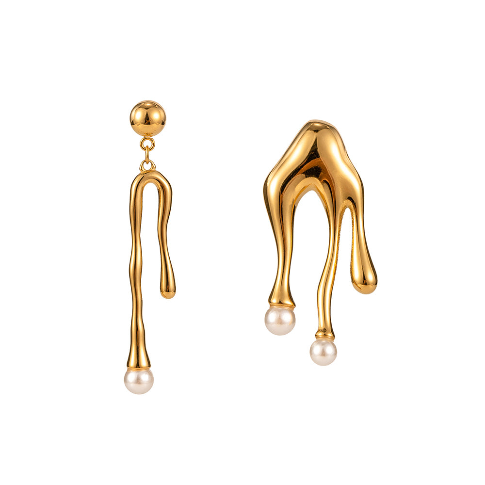 Melted Gold earrings with pearl drops on a white background
