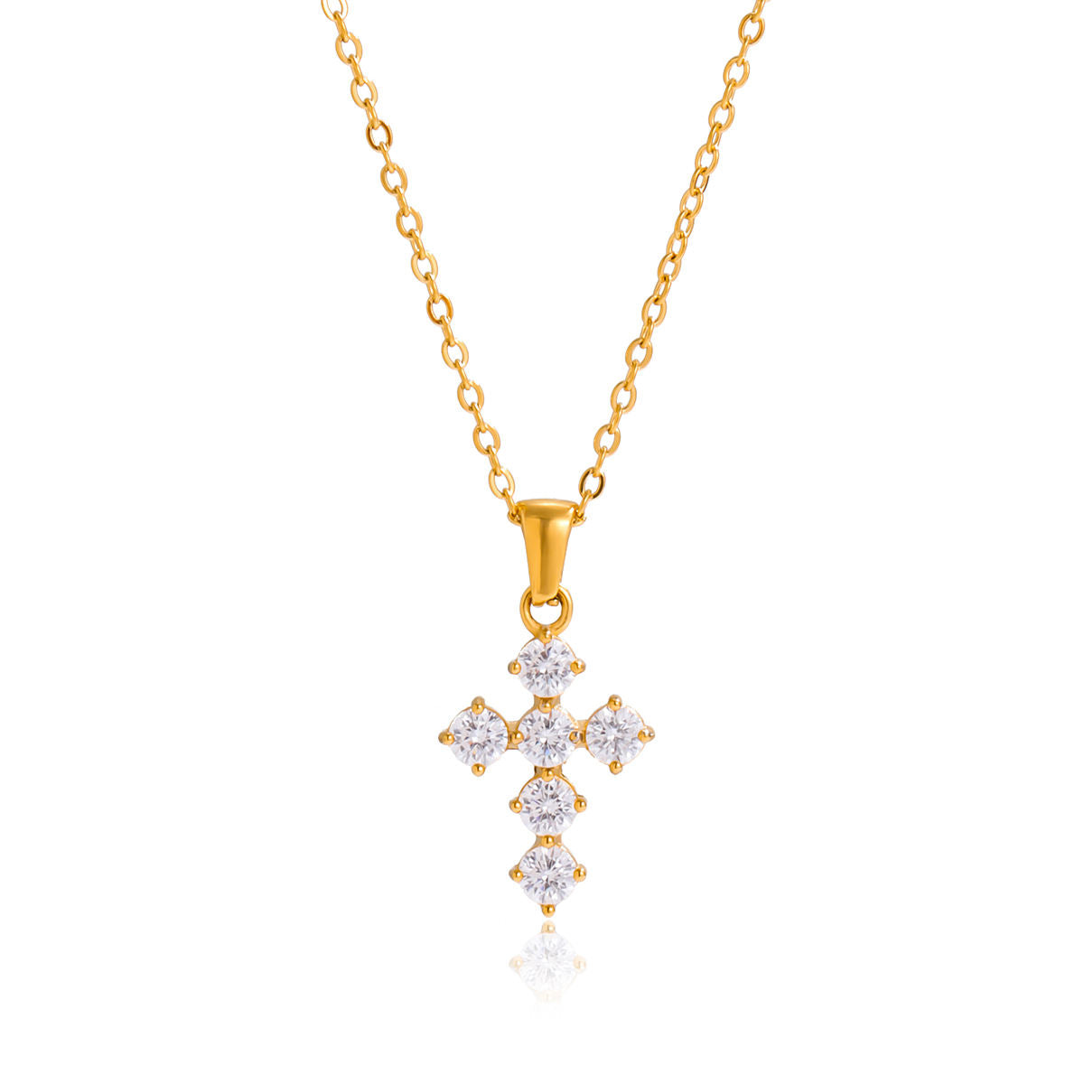 Gold cross pendant necklace with diamonds on a white background