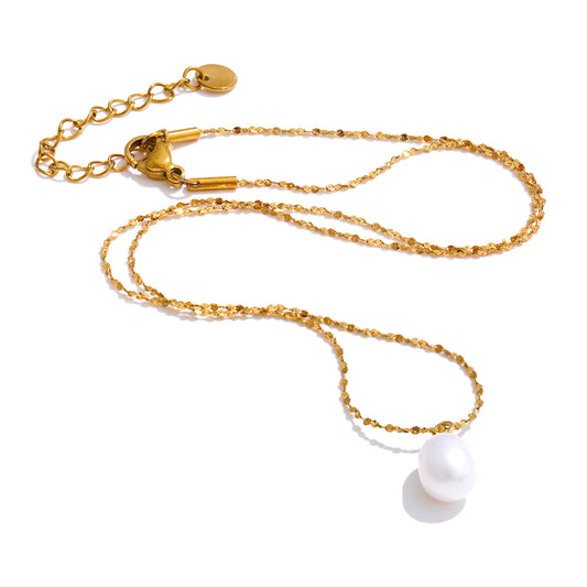 Gold chain lanyard with a white pearl charm on a white background