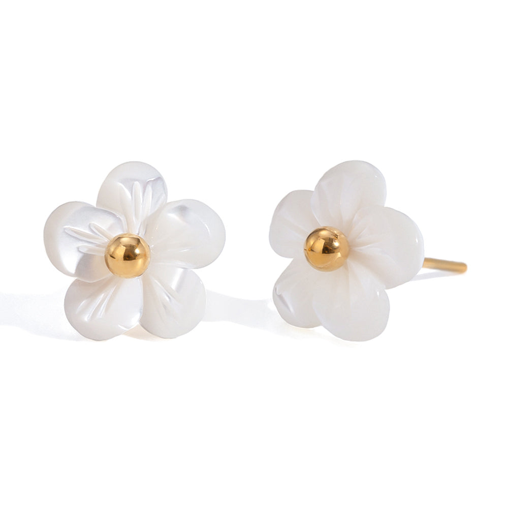 Flower-shaped earrings with gold centers on a white background