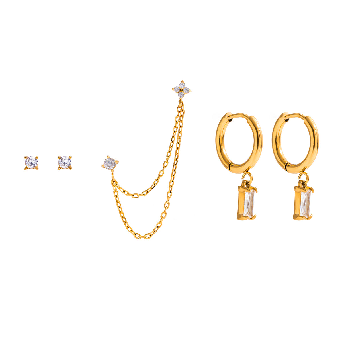 Gold jewelry set with earrings on a white background